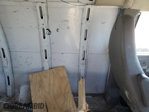 2011 Chevrolet Express Cargo Van with VIN 1GCWGGFAXB1150161, listed as a Copart auction lot 86826564 with 261,863 mi miles and Salvage Title. Bid and sale history available at carsss.com. Image 11.