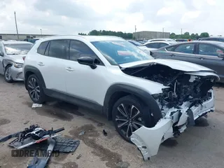2024 Mazda CX-50 Premium z VIN 7MMVABDY4RN214648, wystawiony jako IAAI lot #42087818 z przebiegiem 10 541 mil mil oraz . Historia ofert i sprzedaży dostępna na DreamBid. Obrazek 1.