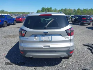 2018 Ford Escape Titanium with VIN 1FMCU9J96JUA33500, listed as a IAAI auction lot 42121736 with 105,430 mi miles and . Bid and sale history available at DreamBid. Image 16.