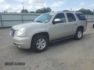 2014 GMC Yukon SLT z VIN 1GKS1CE09ER227842, wystawiony jako Copart lot #60972755 z przebiegiem 144 476 mil mil oraz Szkoda całkowita • Salvage title. Historia ofert i sprzedaży dostępna na DreamBid. Obrazek 1.