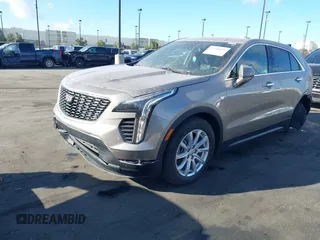 2023 Cadillac XT4 FWD Luxury z VIN 1GYAZAR40PF135132, wystawiony jako IAAI lot #41684609 z przebiegiem 12 164 mil mil oraz . Historia ofert i sprzedaży dostępna na DreamBid. Obrazek 6.