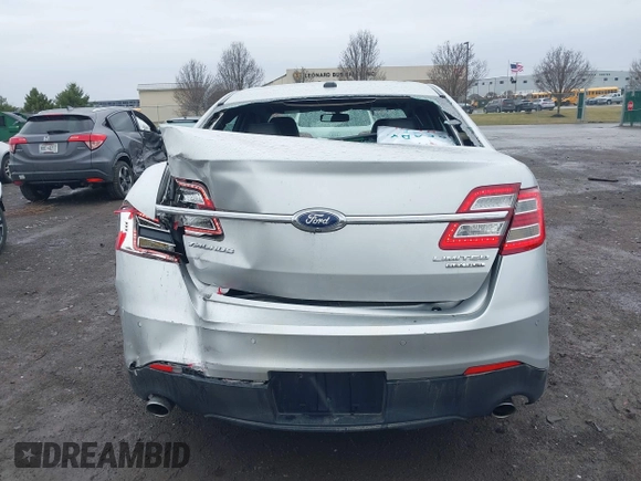 2014 Ford Taurus Limited with VIN 1FAHP2F81EG123933, listed as a IAAI auction lot 41843301 with 111,629 mi miles. Bid and sale history available at carsss.com. Image 16.
