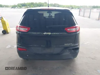 2015 Jeep Cherokee Sport with VIN 1C4PJLAB2FW539397, listed as a IAAI auction lot 42156576 with 120,409 mi miles. Bid and sale history available at carsss.com. Image 16.