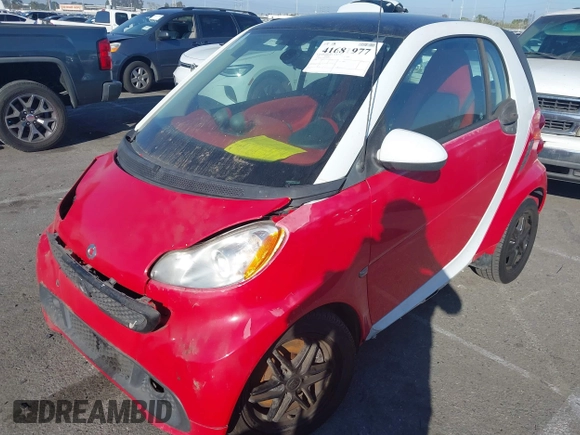2014 Smart fortwo Pure with VIN WMEEJ3BA0EK757200, listed as a IAAI auction lot 41681977 with 99,245 mi miles and . Bid and sale history available at DreamBid. Image 2.