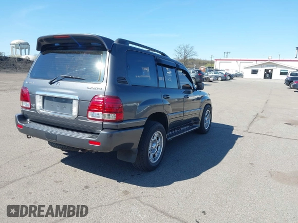 2003 Lexus LX with VIN JTJHT00W033531066, listed as a IAAI auction lot 41969617 with 209,710 mi miles. Bid and sale history available at carsss.com. Image 4.