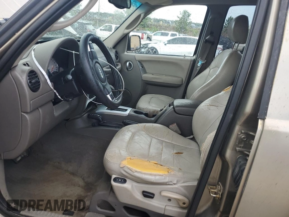 2004 Jeep Liberty Limited z VIN 1J4GL58K64W298687, wystawiony jako Copart lot #56677595 z przebiegiem 180 825 mil mil oraz Szkoda całkowita • Salvage title. Historia ofert i sprzedaży dostępna na DreamBid. Obrazek 7.