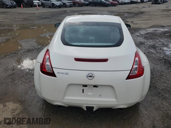 2012 Nissan 370Z z VIN JN1AZ4EHXCM562486, wystawiony jako Copart lot #44594005 z przebiegiem 79 150 mil mil oraz Szkoda całkowita • Salvage title. Historia ofert i sprzedaży dostępna na DreamBid. Obrazek 10.