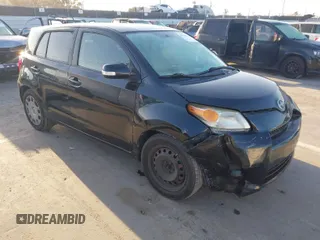 2011 Scion xD with VIN JTKKU4B46B1009909, listed as a IAAI auction lot 41959824 with 185,764 mi miles. Bid and sale history available at carsss.com. Image 1.