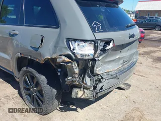 2019 Jeep Grand Cherokee Laredo E with VIN 1C4RJFAG8KC849782, listed as a IAAI auction lot 42151331 with 141,099 mi miles and . Bid and sale history available at DreamBid. Image 6.