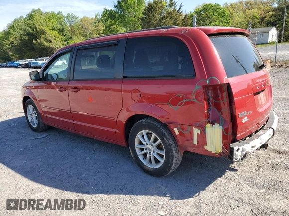2014 Dodge Grand Caravan SXT with VIN 2C4RDGCG5ER182160, listed as a Copart auction lot 54140505 with 61,576 mi miles and Salvage Title. Bid and sale history available at DreamBid. Image 2.