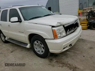 2002 Cadillac Escalade z VIN 1GYEK63N82R235118, wystawiony jako Copart lot #82691054 z przebiegiem 196 955 mil mil oraz Szkoda całkowita • Salvage title. Historia ofert i sprzedaży dostępna na DreamBid. Obrazek 12.