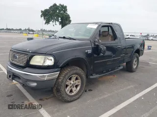 2003 Ford F-150 XL with VIN 1FTRX18LX3NB16806, listed as a IAAI auction lot 42065093 with 110,480 mi miles. Bid and sale history available at carsss.com. Image 2.