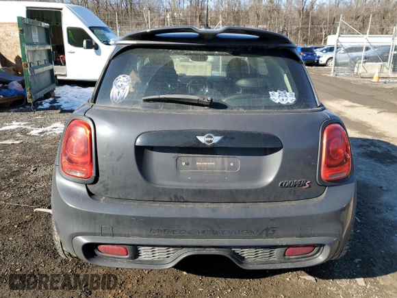 2014 MINI Hardtop S z VIN WMWXM7C54ET970410, wystawiony jako Copart lot #87269984 z przebiegiem 132 913 mil mil oraz Szkoda całkowita • Salvage title. Historia ofert i sprzedaży dostępna na DreamBid. Obrazek 6.