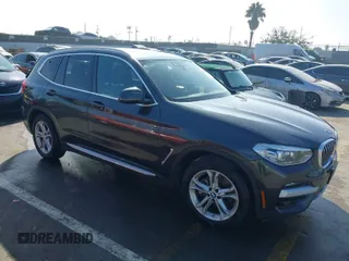 2021 BMW X3 sDrive30i with VIN 5UXTY3C08M9G12128, listed as a IAAI auction lot 41562192 with 33,977 mi miles. Bid and sale history available at carsss.com. Image 1.
