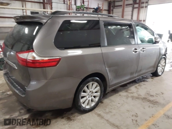 2015 Toyota Sienna Ltd with VIN 5TDDK3DC3FS106157, listed as a IAAI auction lot 41737202 with 173,724 mi miles. Bid and sale history available at carsss.com. Image 4.