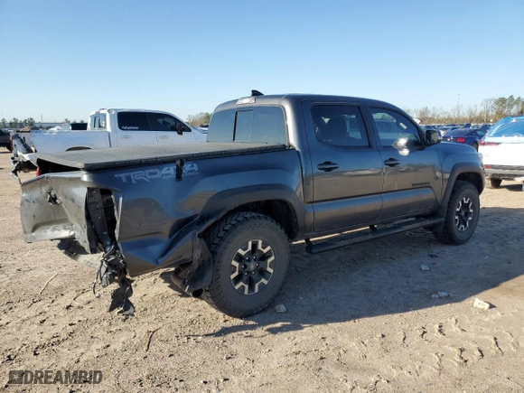 2019 Toyota Tacoma 4WD SR with VIN 3TMCZ5AN7KM287170, listed as a Copart auction lot 48313365 with 75,986 mi miles and Salvage Title. Bid and sale history available at carsss.com. Image 3.