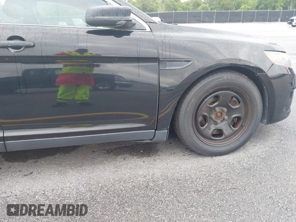 2014 Ford Police Interceptor with VIN 1FAHP2MKXEG105669, listed as a IAAI auction lot 42240752 with 133,148 mi miles and . Bid and sale history available at DreamBid. Image 12.