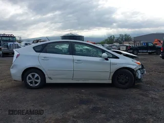 2015 Toyota Prius Four with VIN JTDKN3DU3F1986099, listed as a IAAI auction lot 41518701 with 146,291 mi miles and . Bid and sale history available at DreamBid. Image 14.