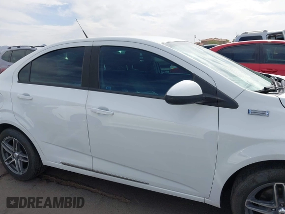 2013 Chevrolet Sonic LS with VIN 1G1JA5SH9D4249356, listed as a IAAI auction lot 42373352 with 151,337 mi miles and . Bid and sale history available at DreamBid. Image 14.