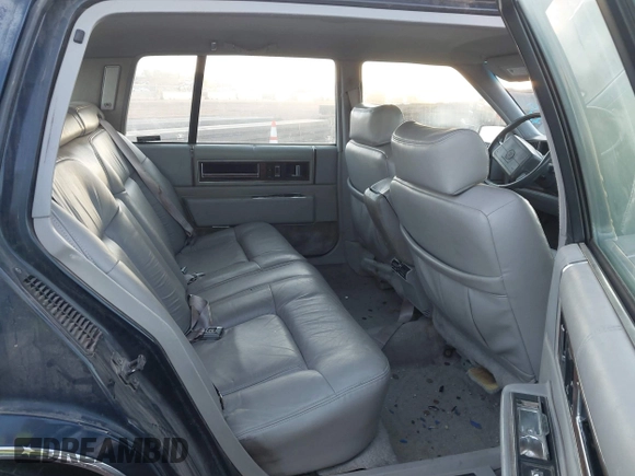1992 Cadillac DeVille z VIN 1G6CD53B9N4283805, wystawiony jako IAAI lot #41957787 z przebiegiem 88 791 mil mil oraz . Historia ofert i sprzedaży dostępna na DreamBid. Obrazek 8.