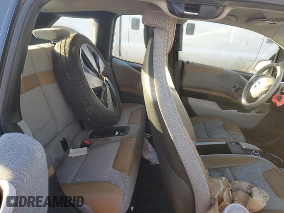 2016 BMW i3 z VIN WBY1Z4C59GV506222, wystawiony jako Copart lot #79509464 z przebiegiem 84 453 mil mil oraz Szkoda całkowita • Salvage title. Historia ofert i sprzedaży dostępna na DreamBid. Obrazek 10.