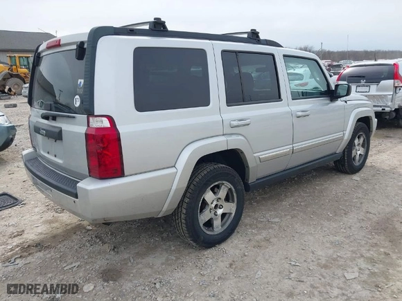 2010 Jeep Commander Sport with VIN 1J4RG4GK1AC158407, listed as a IAAI auction lot 41883678 with 206,949 mi miles. Bid and sale history available at carsss.com. Image 4.