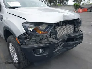2019 Ford Ranger XL with VIN 1FTER4EH2KLA58341, listed as a IAAI auction lot 42039276 with 100,387 mi miles and . Bid and sale history available at carsss.com. Image 20.