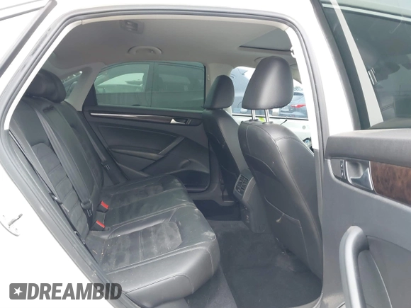 2014 Volkswagen Passat TDI SEL Premium with VIN 1VWCN7A32EC035738, listed as a IAAI auction lot 41641843 with 151,159 mi miles. Bid and sale history available at carsss.com. Image 8.