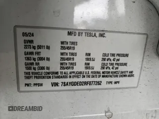 2024 Tesla Model Y z VIN 7SAYGDED2RF077262, wystawiony jako Copart lot #47797735 z przebiegiem 9 574 mil mil oraz Szkoda całkowita • Salvage title. Historia ofert i sprzedaży dostępna na DreamBid. Obrazek 15.
