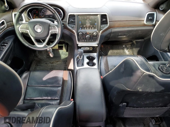 2016 Jeep Grand Cherokee Overland with VIN 1C4RJFCG8GC402339, listed as a Copart auction lot 47553385 with 121,486 mi miles and Salvage title. Bid and sale history available at DreamBid. Image 8.