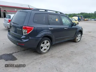 2009 Subaru Forester X with VIN JF2SH63679H701039, listed as a IAAI auction lot 42701876 with 127,401 mi miles and . Bid and sale history available at DreamBid. Image 4.