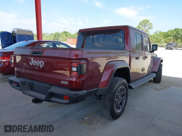 2021 Jeep Gladiator Overland z VIN 1C6HJTFGXML553983, wystawiony jako IAAI lot #41903068 z przebiegiem 54 386 mil mil oraz . Historia ofert i sprzedaży dostępna na DreamBid. Obrazek 4.