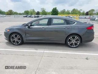 2017 Ford Fusion Titanium with VIN 3FA6P0D93HR261526, listed as a IAAI auction lot 42277350 with 117,388 mi miles and . Bid and sale history available at DreamBid. Image 14.