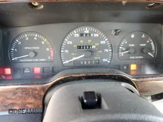 1990 Mercury Sable z VIN 1MECM50U6LG650642, wystawiony jako Copart lot #68279364 z przebiegiem 77 204 mil mil oraz Tytuł czysty. Historia ofert i sprzedaży dostępna na DreamBid. Obrazek 9.