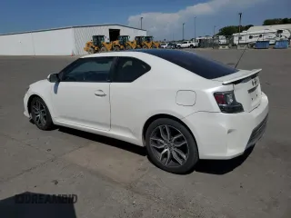 2015 Scion tC with VIN JTKJF5C7XF3092825, listed as a Copart auction lot 54870395 with 130,963 mi miles and Clean Title. Bid and sale history available at carsss.com. Image 2.