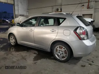2009 Pontiac Vibe w/1SB with VIN 5Y2SP670X9Z424162, listed as a Copart auction lot 84039474 with 152,690 mi miles and Salvage Title. Bid and sale history available at carsss.com. Image 2.