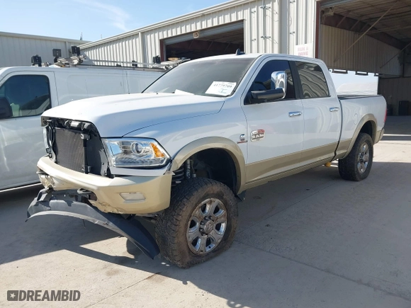 2014 Ram 2500 Longhorn with VIN 3C6UR5GLXEG244401, listed as a IAAI auction lot 41779709 with 180,760 mi miles. Bid and sale history available at carsss.com. Image 2.