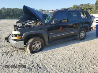 2002 Chevrolet Tahoe LS with VIN 1GNEC13Z62J211284, listed as a Copart auction lot 69503904 with 140,987 mi miles and Non Repairable. Bid and sale history available at carsss.com. Image 1.