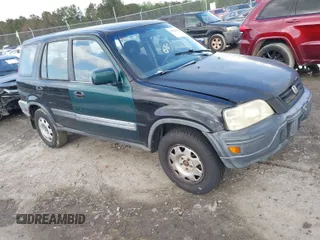 2000 Honda CR-V LX with VIN JHLRD2841YC012945, listed as a IAAI auction lot 41878294 with 306,110 mi miles. Bid and sale history available at carsss.com. Image 1.