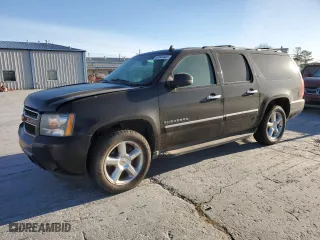 2012 Chevrolet Suburban LTZ with VIN 1GNSKKE71CR310010, listed as a Copart auction lot 48943445 with 311,512 mi miles and Clean Title. Bid and sale history available at carsss.com. Image 1.