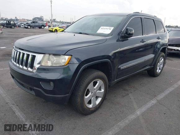 2013 Jeep Grand Cherokee Laredo with VIN 1C4RJEAGXDC620968, listed as a IAAI auction lot 41425270 with 127,739 mi miles. Bid and sale history available at carsss.com. Image 17.