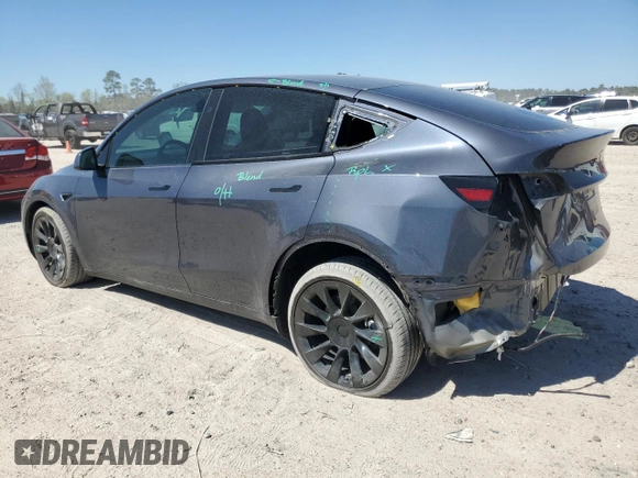 2023 Tesla Model Y Long Range z VIN 7SAYGDEE8PA185193, wystawiony jako Copart lot #48706215 z przebiegiem 10 451 mil mil oraz Szkoda całkowita • Salvage title. Historia ofert i sprzedaży dostępna na DreamBid. Obrazek 2.