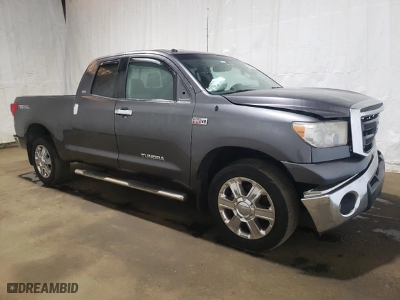 2013 Toyota Tundra 4WD Truck with VIN 5TFUW5F12DX302562, listed as a Copart auction lot 80674884 with 202,783 mi miles and Salvage Title. Bid and sale history available at carsss.com. Image 4.
