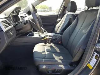 2014 BMW 3 Series 320i with VIN WBA3B1C54EK132952, listed as a Copart auction lot 63653435 with 63,260 mi miles and Salvage title. Bid and sale history available at DreamBid. Image 7.