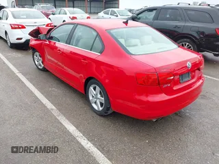 2014 Volkswagen Jetta TDI w/Premium/Nav with VIN 3VWLL7AJ4EM383351, listed as a IAAI auction lot 42424074 with 66,824 mi miles and . Bid and sale history available at DreamBid. Image 3.