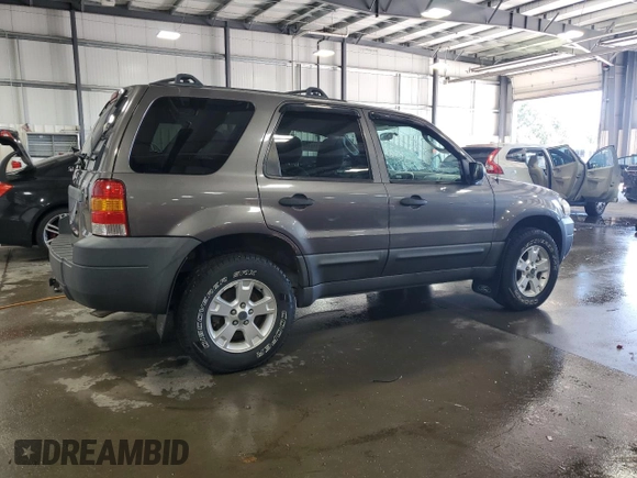 2005 Ford Escape XLT with VIN 1FMYU93135KD88798, listed as a Copart auction lot 69311714 with 81,126 mi miles and Salvage Title. Bid and sale history available at carsss.com. Image 3.