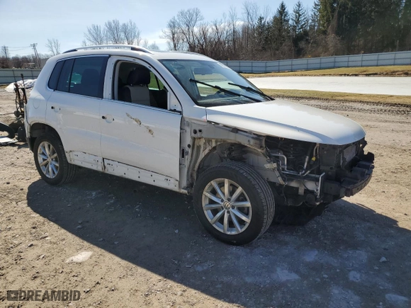 2017 Volkswagen Tiguan Wolfsburg Edition with VIN WVGSV7AX4HK004207, listed as a Copart auction lot 48393855 with 104,476 mi miles and Salvage Title. Bid and sale history available at carsss.com. Image 4.