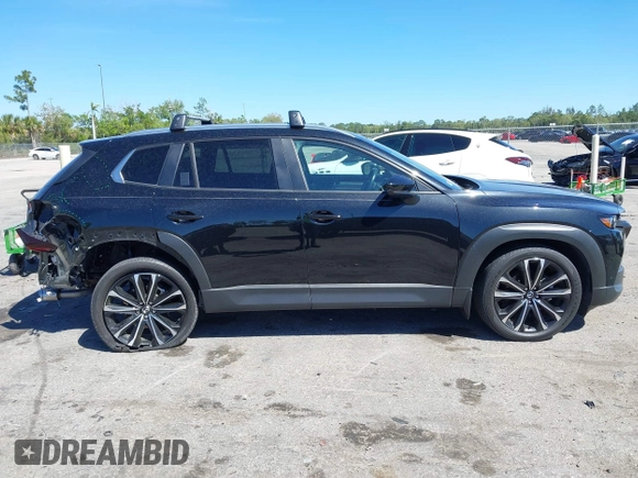 2023 Mazda CX-50 2.5 Turbo with VIN 7MMVABXY1PN126178, listed as a IAAI auction lot 41707411 with 27,179 mi miles. Bid and sale history available at carsss.com. Image 14.
