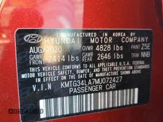 2021 Genesis G70 2.0T z VIN KMTG34LA7MU072427, wystawiony jako Copart lot #44069455 z przebiegiem 66 457 mil mil oraz Szkoda całkowita • Salvage title. Historia ofert i sprzedaży dostępna na DreamBid. Obrazek 12.