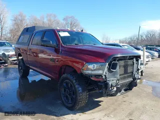 2016 Ram 2500 Laramie with VIN 3C6UR5FL7GG368646, listed as a IAAI auction lot 41649574 with 302,360 mi miles. Bid and sale history available at carsss.com. Image 1.